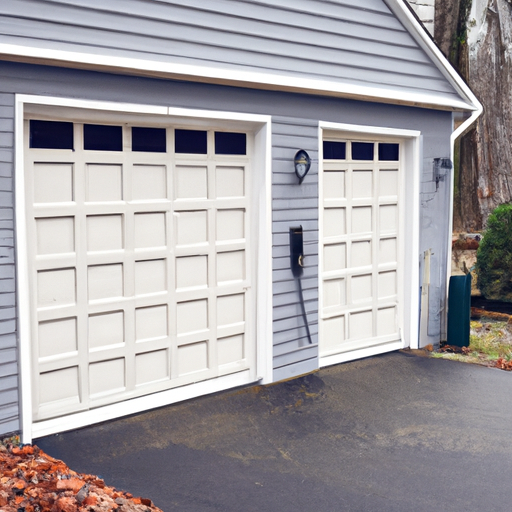 Residential garage door on a Clinton, NJ home with visible panels, hinges and bottom seal, overcast autumn setting.