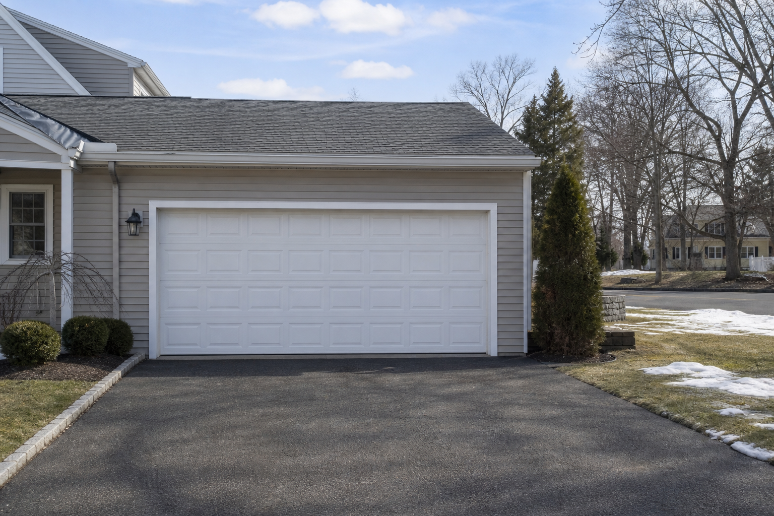 Suburban garage exterior in Clinton, NJ with a visible closed garage door