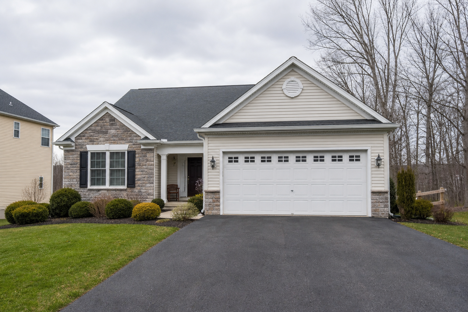 Suburban home in Clinton, NJ with a visible garage door and driveway